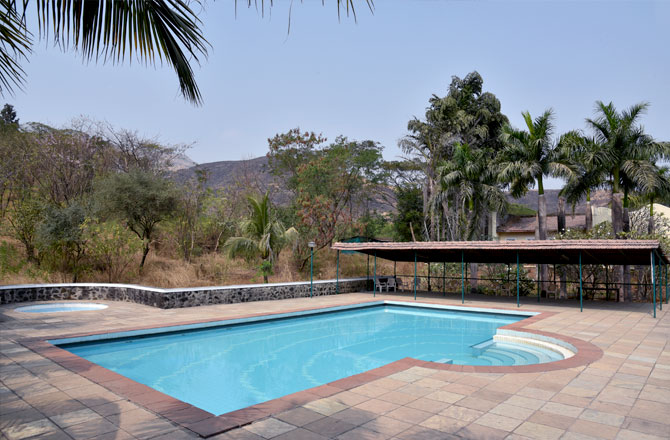 Swimming Pool surrounded by hills